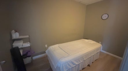 Peaceful massage room at Stony Brook, Oriental Massage and Acupuncture Clinic, Stony Brook, New York, US.