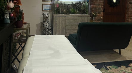 Cozy interior of I D BEAUTY, Stoke-on-Trent, England. Plush seating and stylish decor enhance the relaxing ambiance.