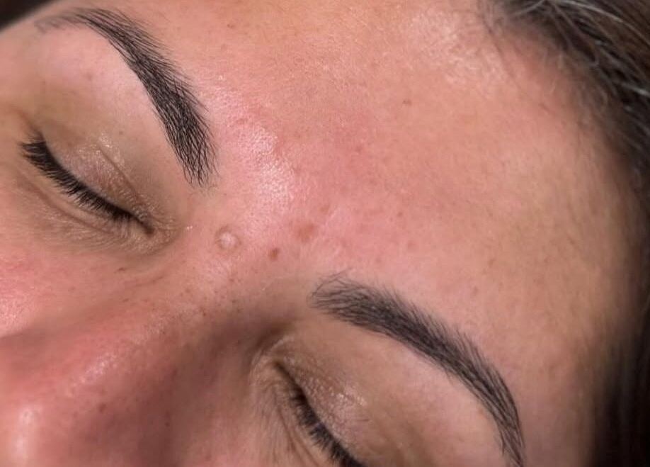 Close-up of smooth skin and perfectly shaped eyebrows at Zoila Beauty, Centereach, New York, US.
