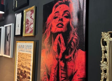 Gallery wall at Sirenstudio_co, Blacksmiths, New South Wales, AU highlighting vibrant artwork.