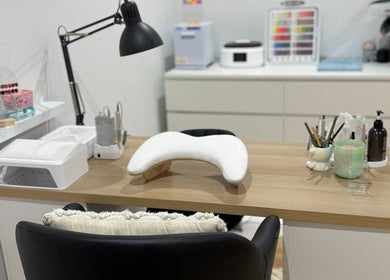 Manicure station at Cece Valley Nail Boutique, Angle Vale, South Australia, AU. Modern setup with tools and polish.
