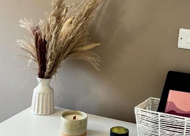 Ethereal Beauty's serene decor with vase and candles, Lydney, England, GB.