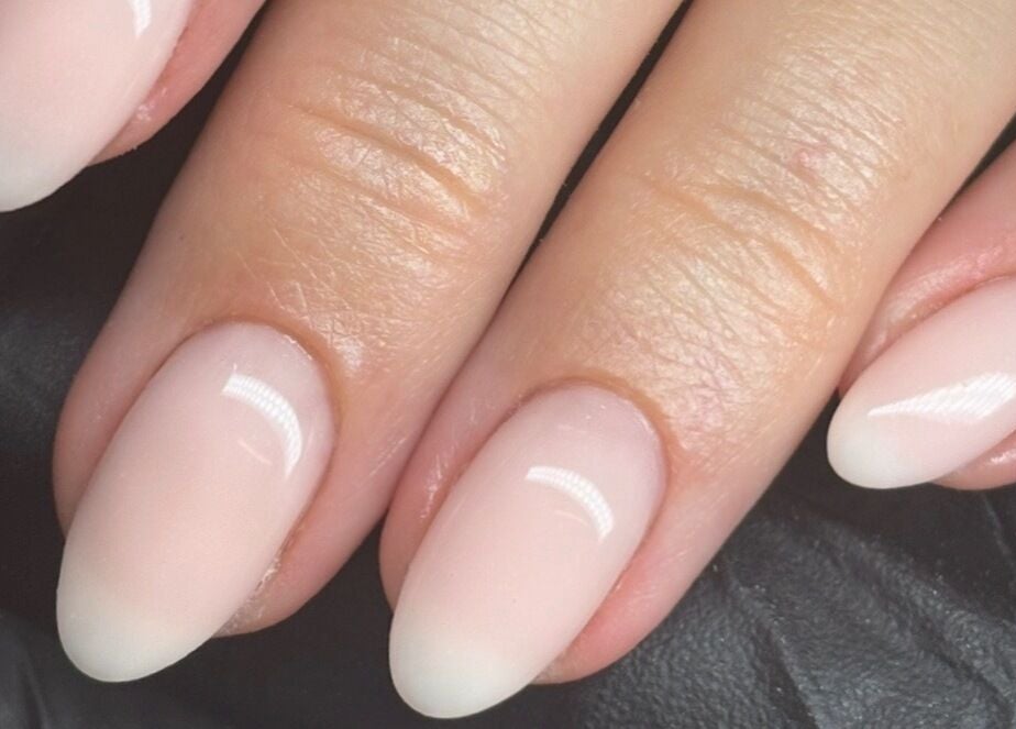 Close-up of polished nails from LTbeauty, Newton Abbot, England, GB highlighting chic manicure style.