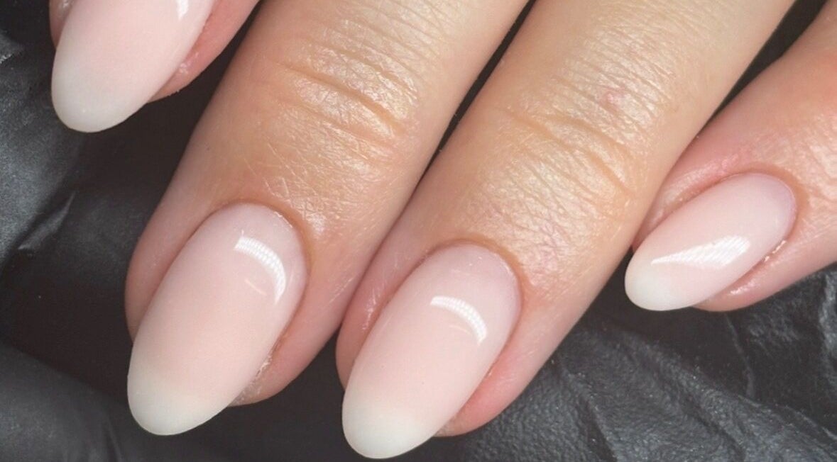 Close-up of polished nails from LTbeauty, Newton Abbot, England, GB highlighting chic manicure style.