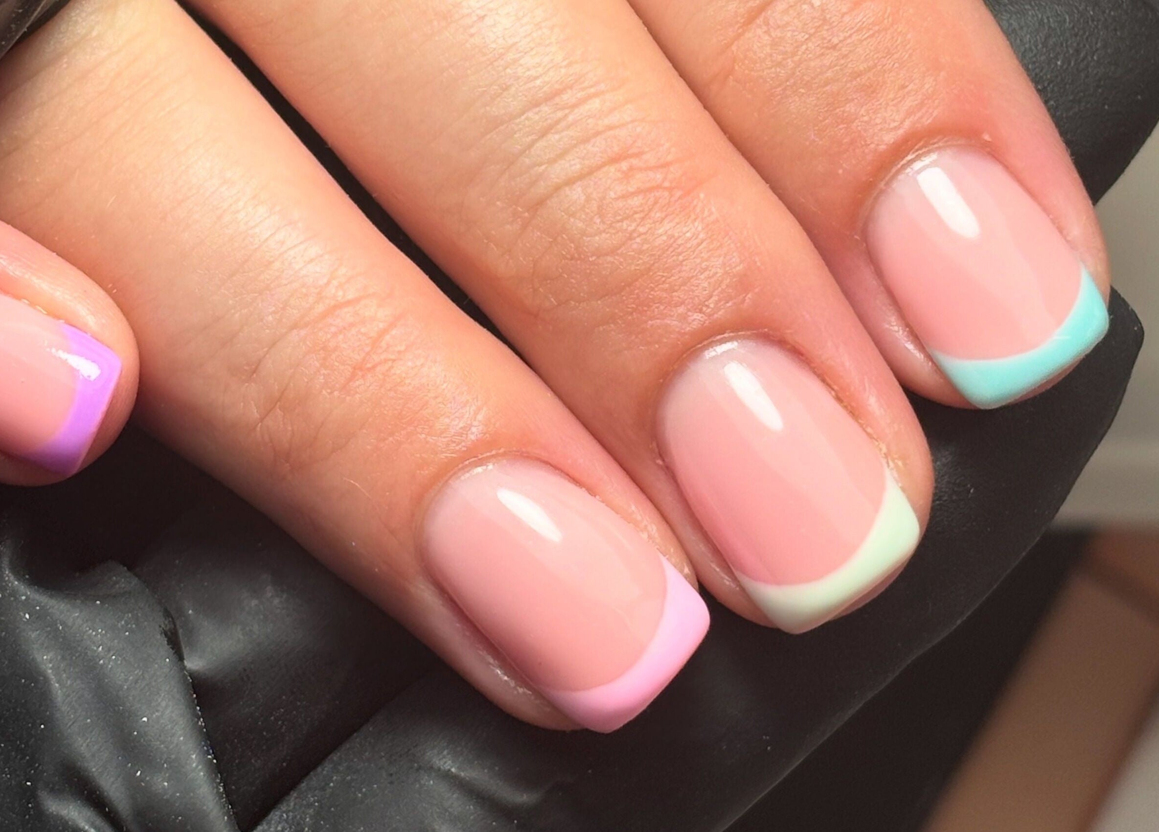 Colorful pastel manicure at LTbeauty in Newton Abbot, England, GB, showcasing delicate nail art designs.