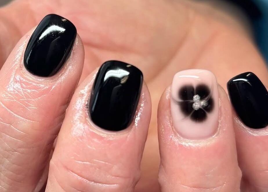 Chic black and floral nail art by LTbeauty in Newton Abbot, England, GB.