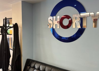 Inside view of Shortys - Markfield with modern decor at Markfield, England, GB, featuring the venue's logo.