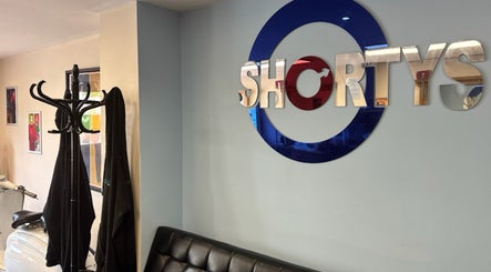 Inside view of Shortys - Markfield with modern decor at Markfield, England, GB, featuring the venue's logo.