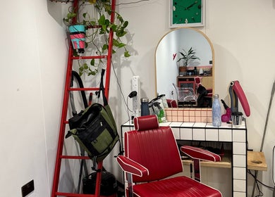 Modern salon chair and decor at Shortys - Leicester, a stylish venue in Leicester, England, GB.