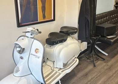 Vintage scooter and modern lounge at Shortys - Markfield, Markfield, England, GB. Unique decor enhances ambiance.