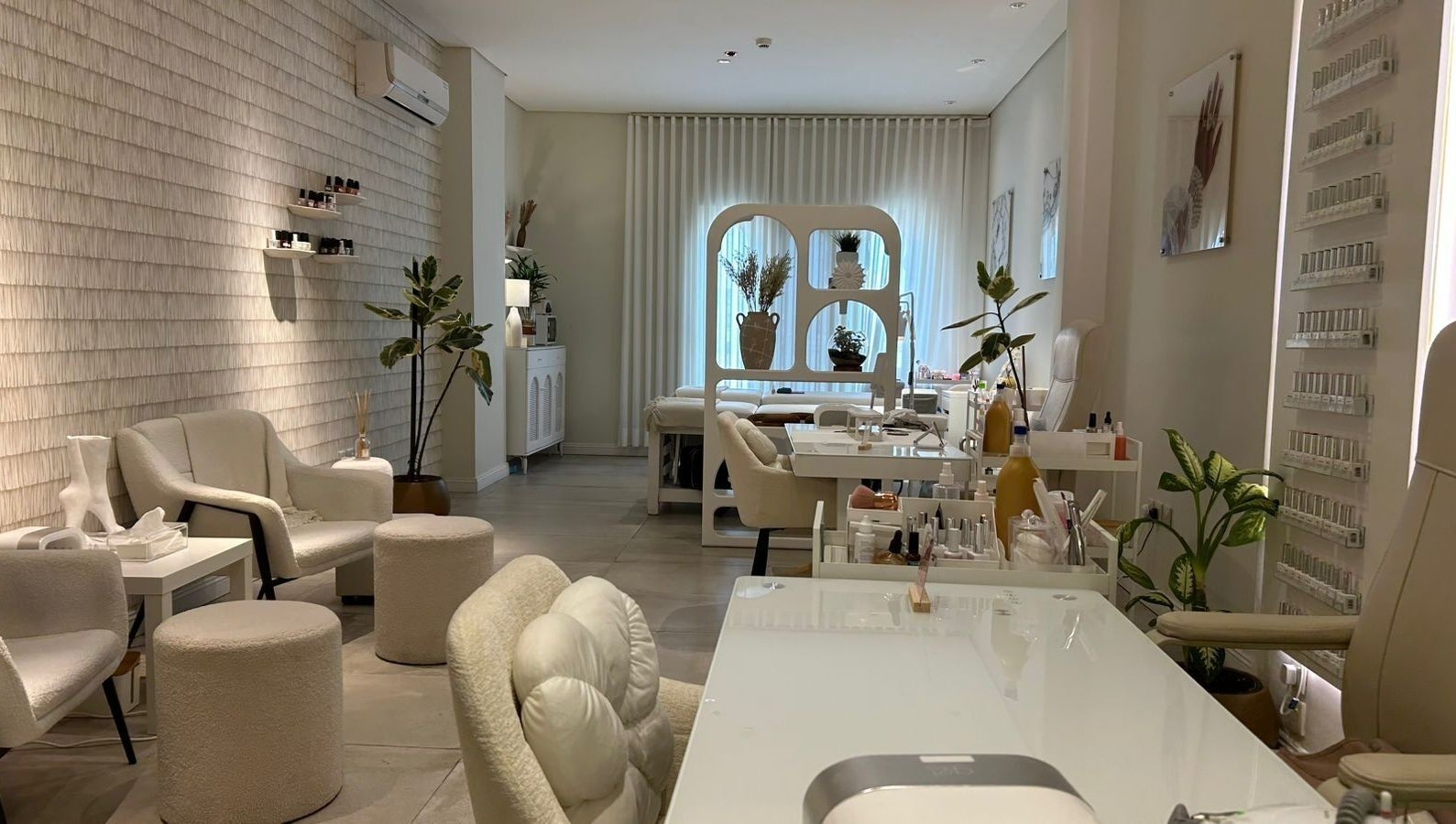 Elegant interior of Nash & More beauty salon in Jeddah, Makkah Province, SA with modern furnishings and decor.