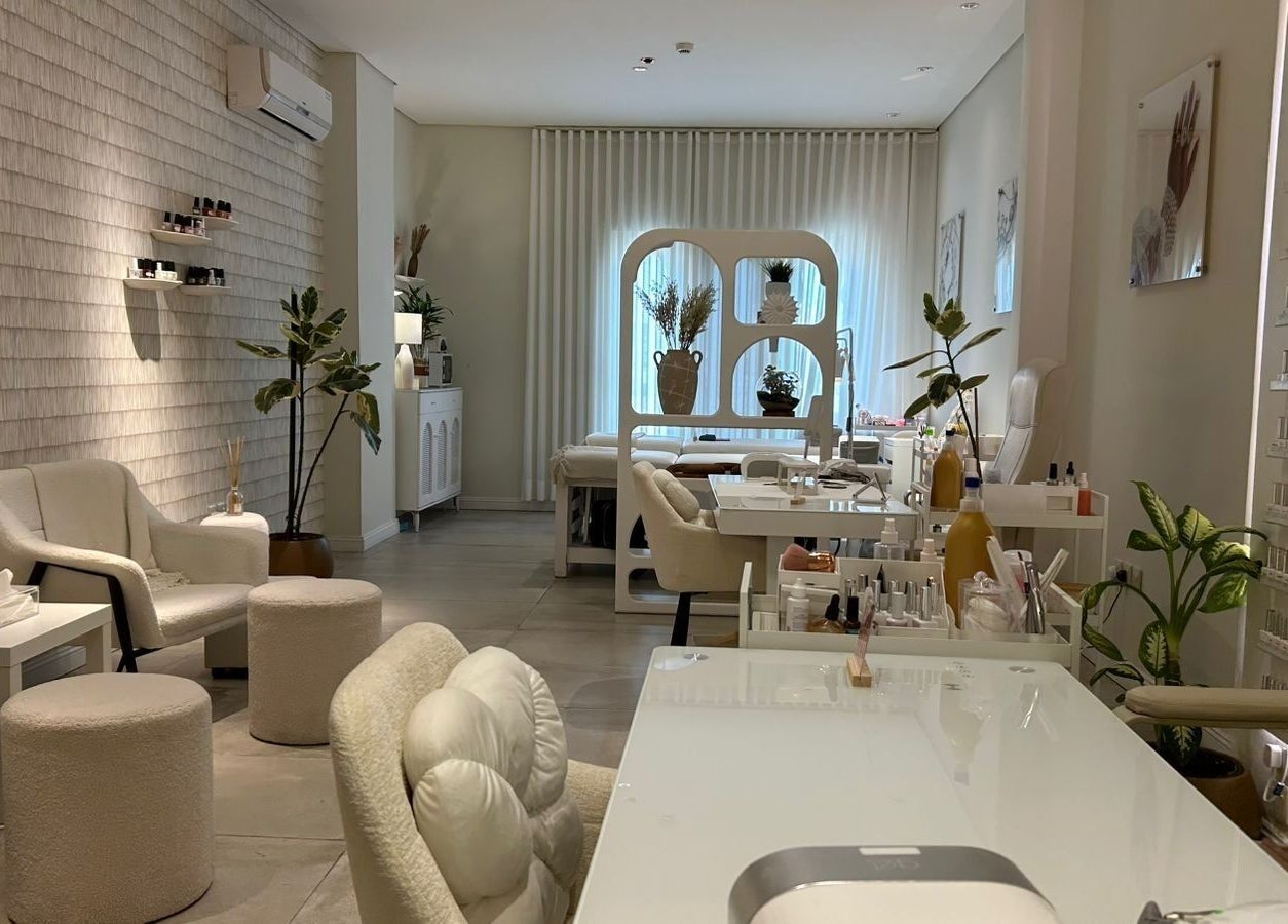 Elegant interior of Nash & More beauty salon in Jeddah, Makkah Province, SA with modern furnishings and decor.