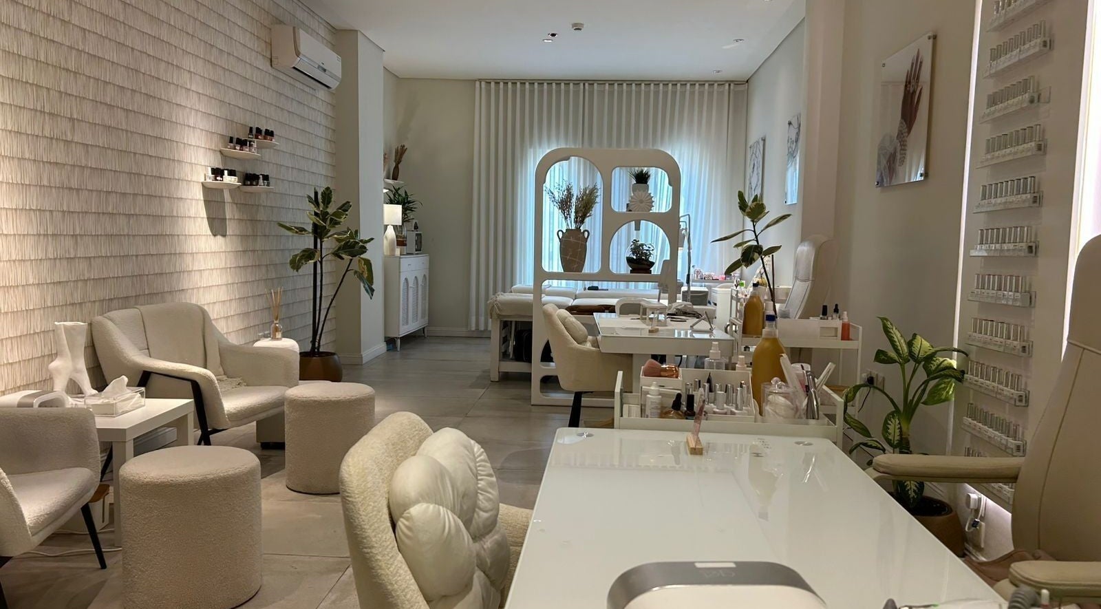 Elegant interior of Nash & More beauty salon in Jeddah, Makkah Province, SA with modern furnishings and decor.