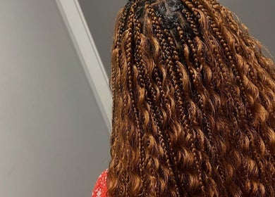 Intricate braids hairstyle at EVSTYLES salon, London, England, GB.