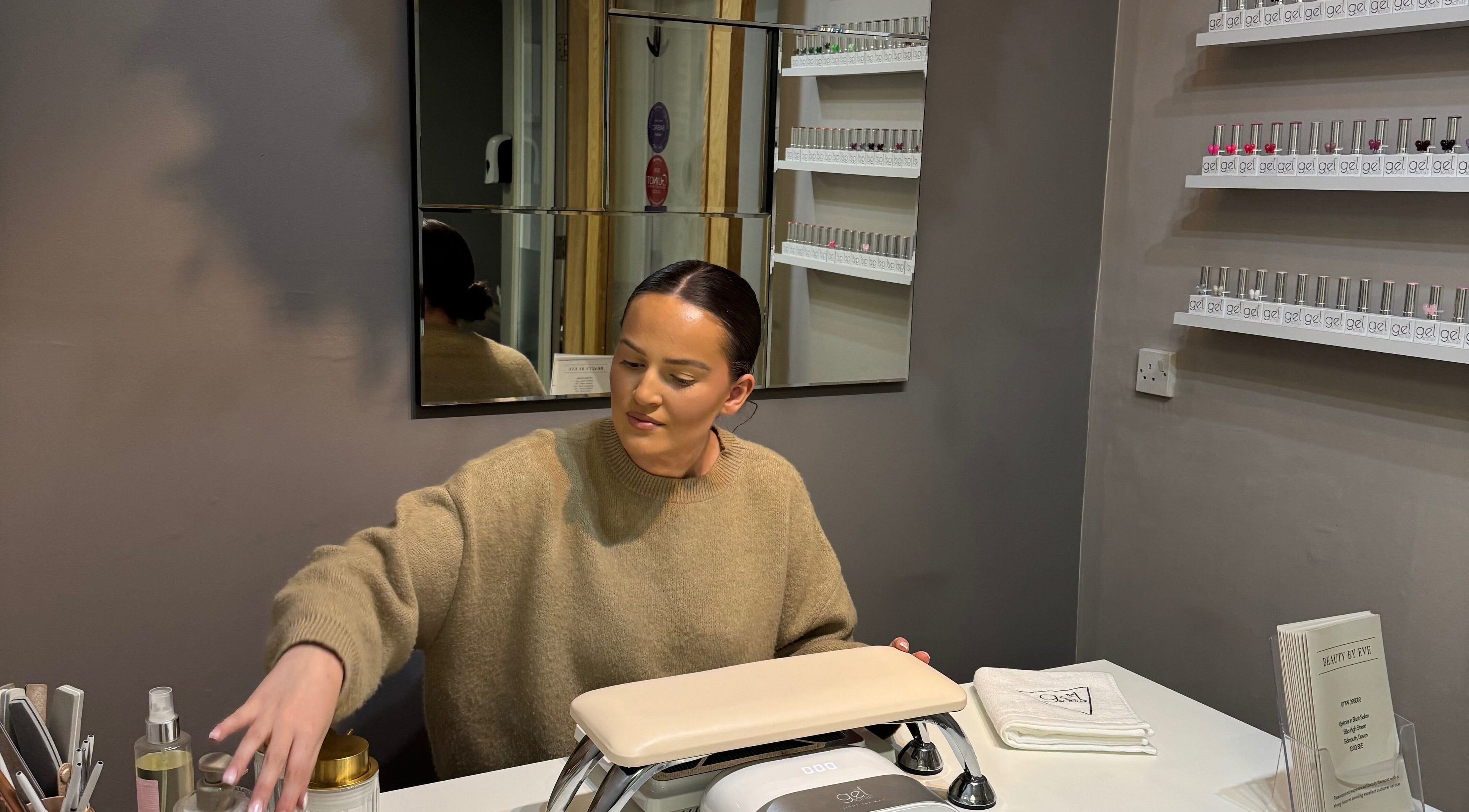 Nail technician at BeautyByEve in Sidmouth, England, GB preparing for a manicure session.