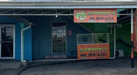 Entrance to The Reset bar in Sangre Grande, TT, showcasing Lakhan's Doubles stand.