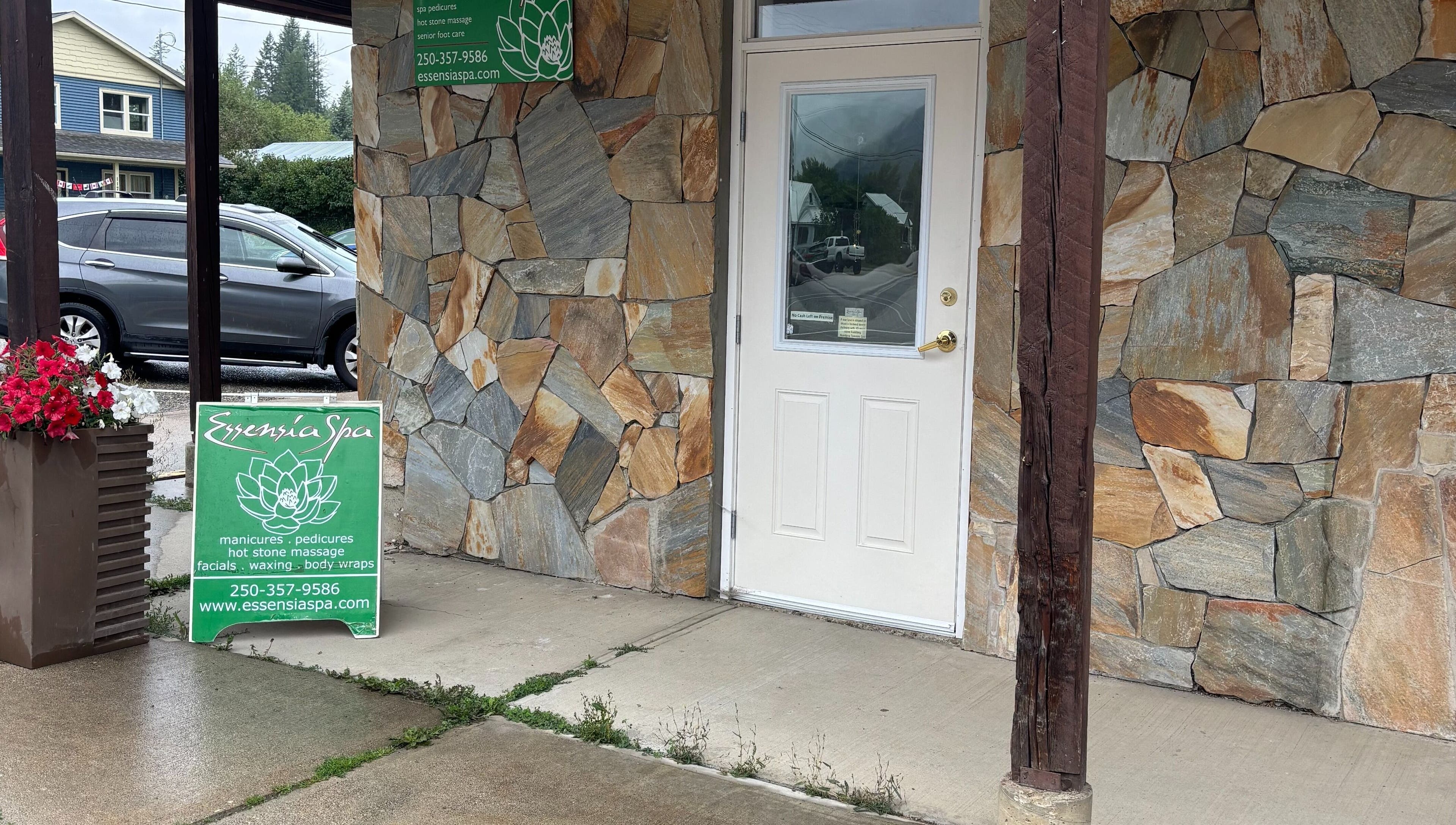 Essensia Spa entrance with stone facade in Salmo, British Columbia, CA.