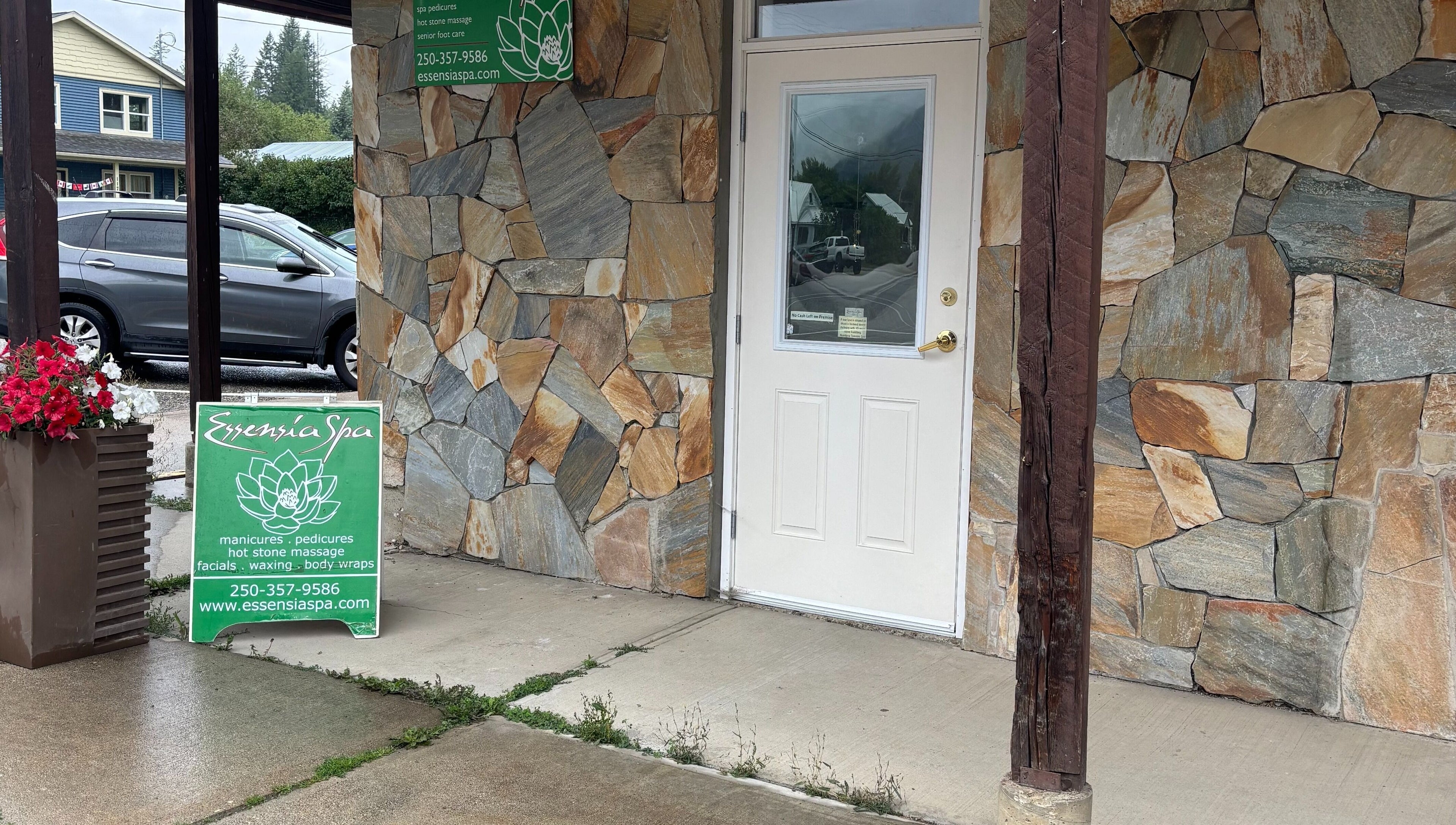 Essensia Spa entrance with stone facade in Salmo, British Columbia, CA.