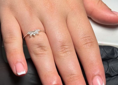 Elegant manicured hand with ring at Shaped by Shannon, Stafford, England, GB.