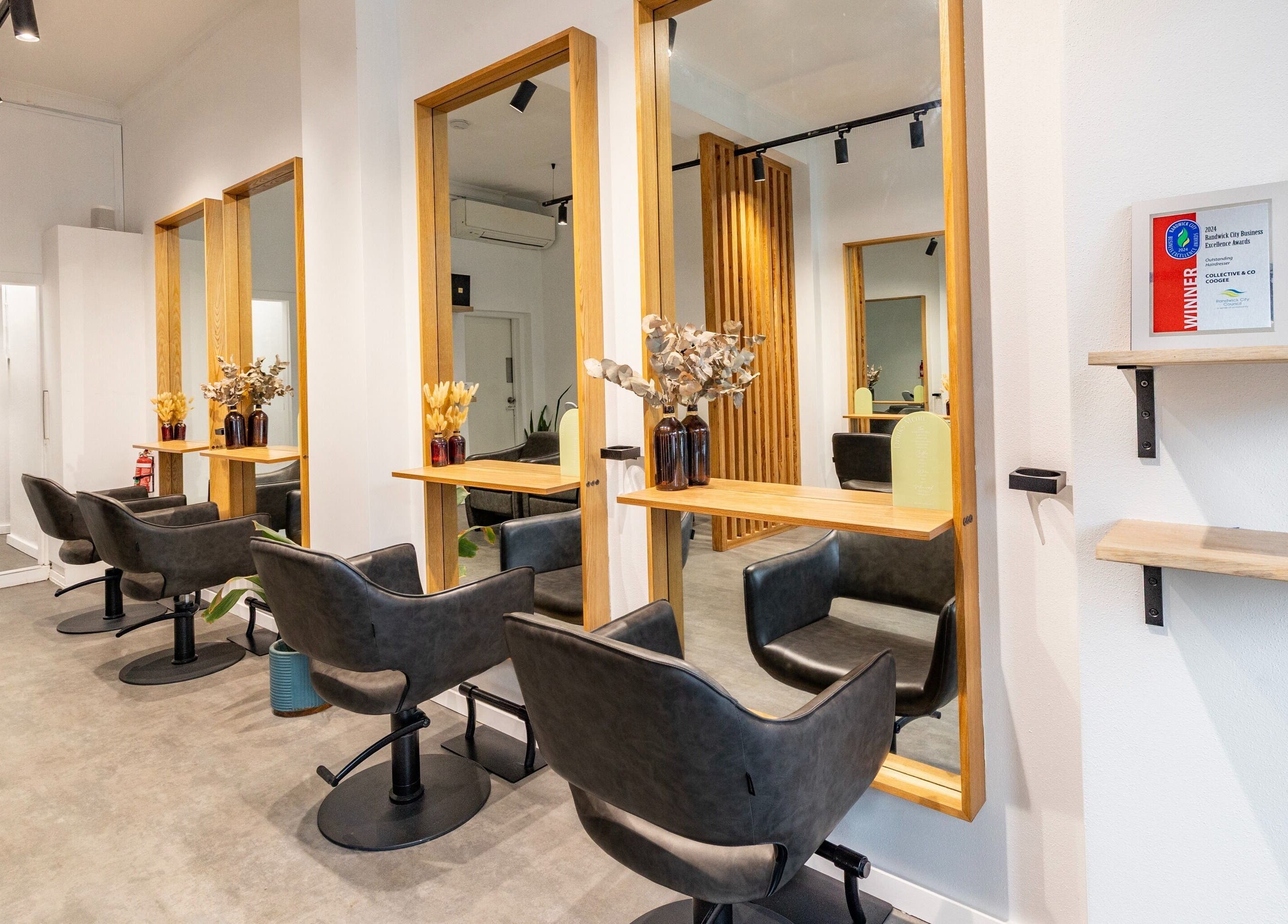 Stylish salon chairs and mirrors at Collective and Co Coogee, Coogee, New South Wales, AU.