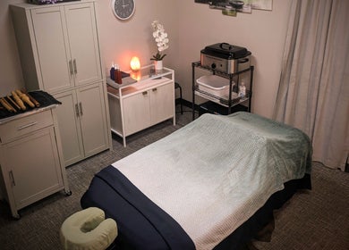 Tranquil massage room at Blue Orchid Massage, Denver, Colorado, US with soft lighting and soothing decor.
