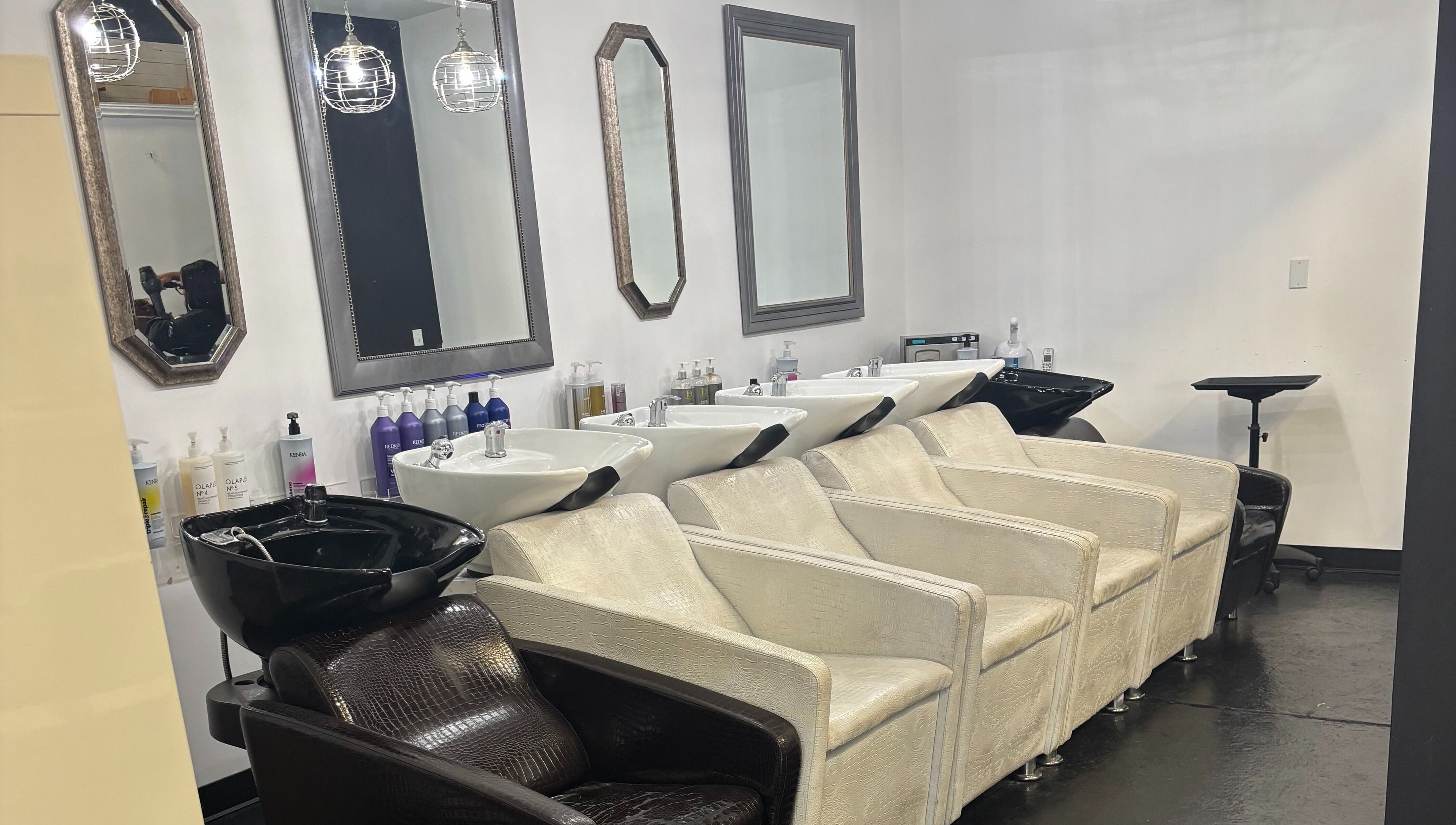 Wash stations at ASHIYA'S in Jersey City, New Jersey, US, offering luxurious salon experiences.