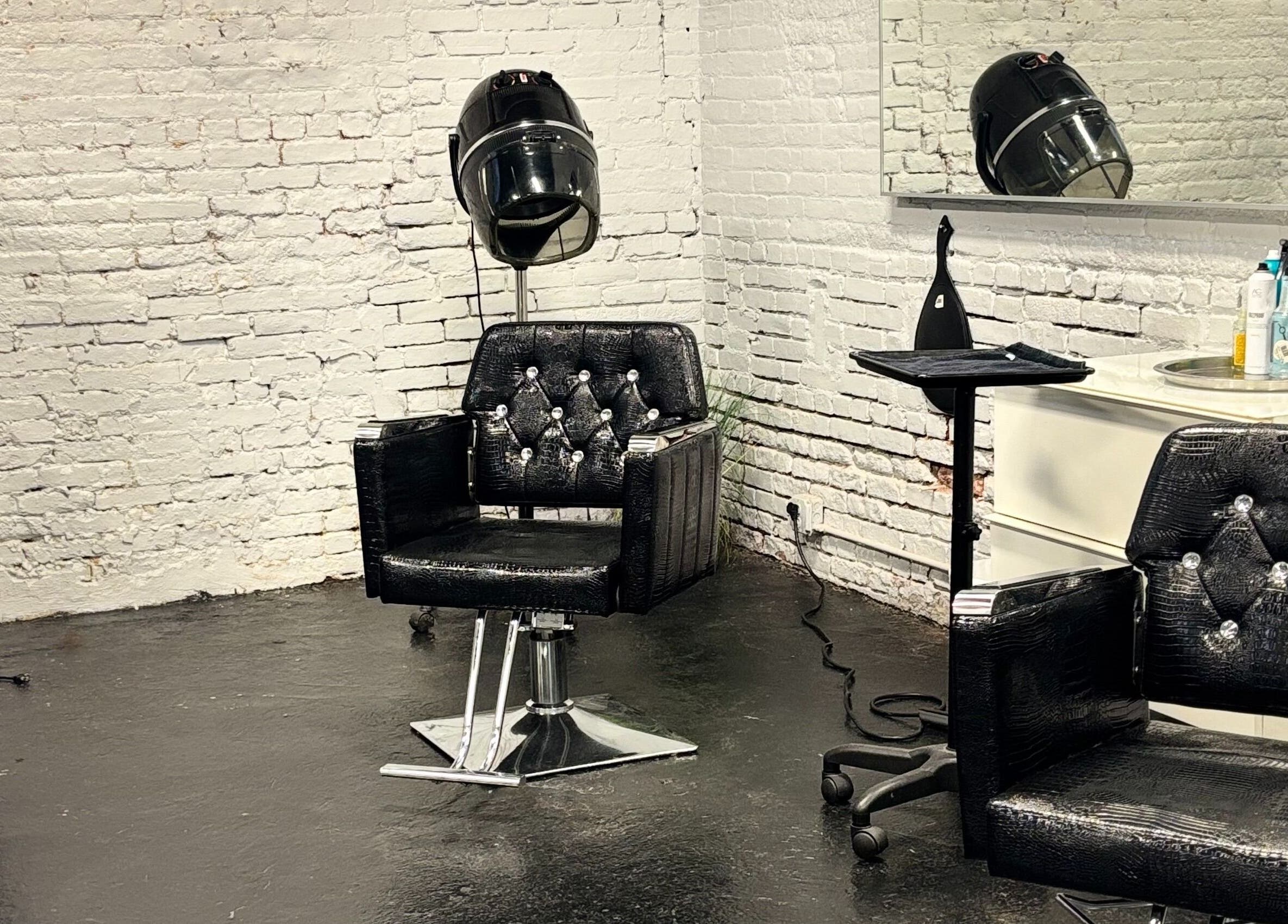 Elegant salon chairs and equipment at ASHIYA'S in Jersey City, New Jersey, US enhance the beauty experience.