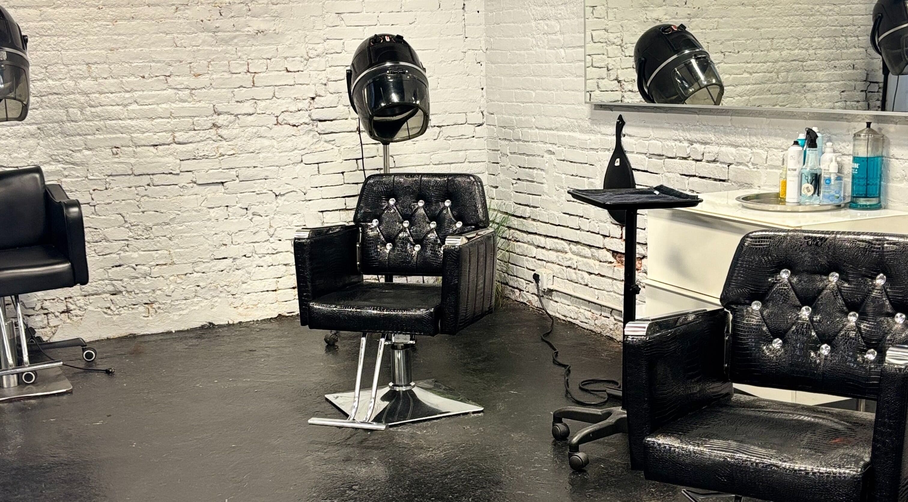 Elegant salon chairs and equipment at ASHIYA'S in Jersey City, New Jersey, US enhance the beauty experience.