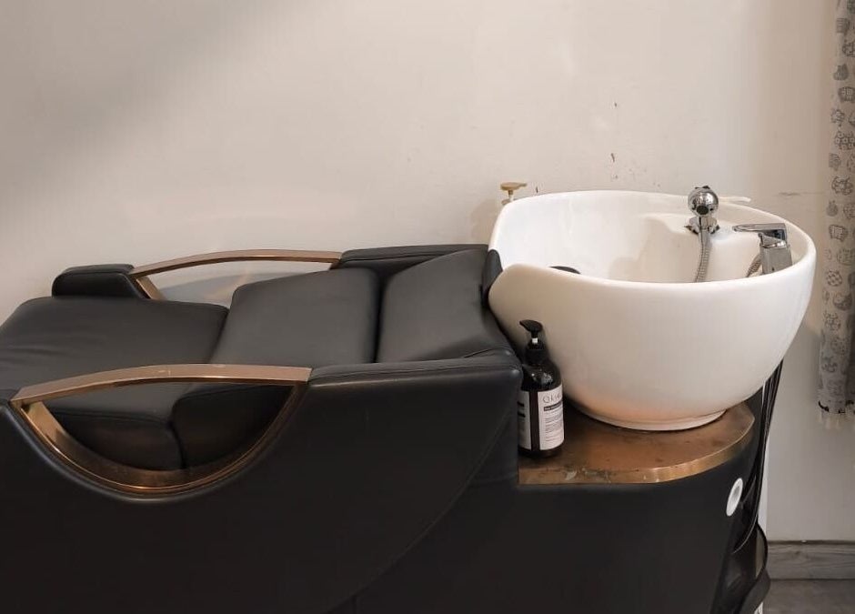 Luxurious hair wash station at J of Salon, Singapore, SG, designed for ultimate client comfort and relaxation.