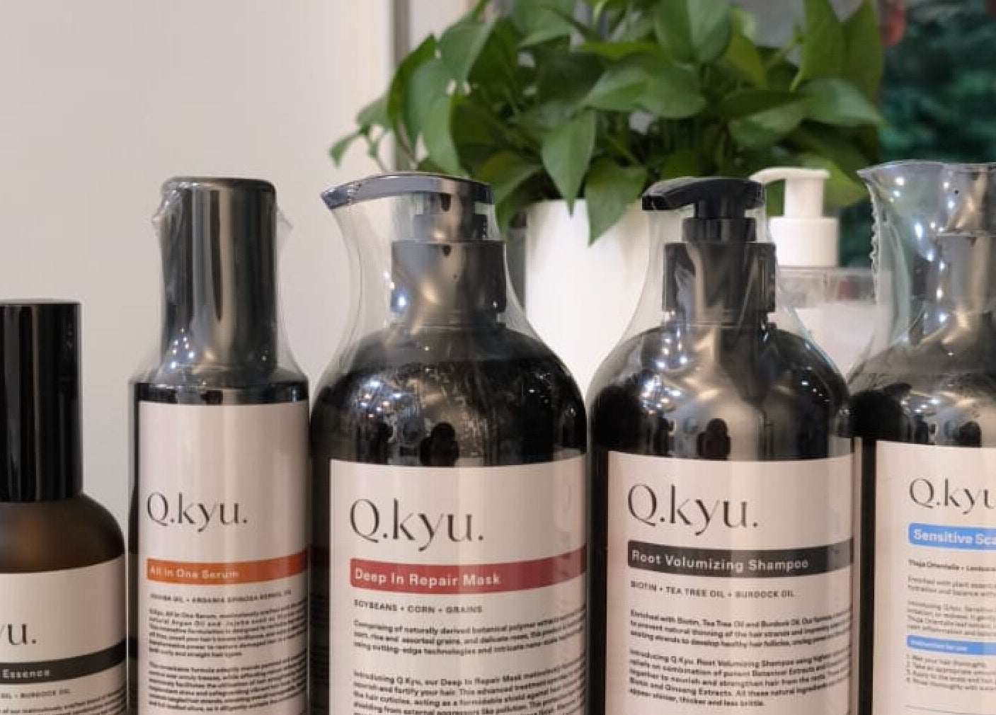 Premium haircare products at J of Salon, Singapore, SG, showcasing a range of quality shampoos and serums.