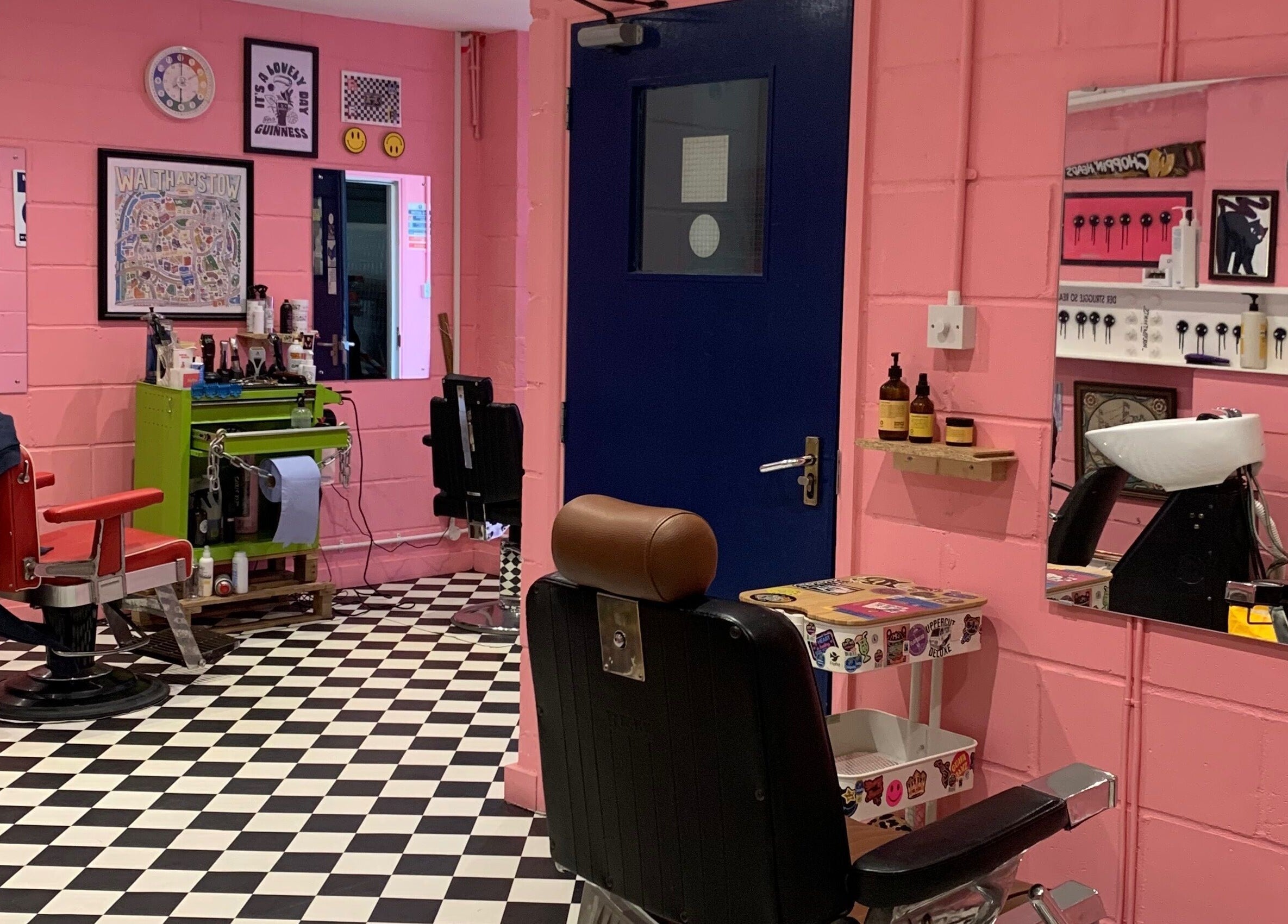 Colorful interior of Little Trimz salon in London, England, GB with retro chairs and stylish decor.