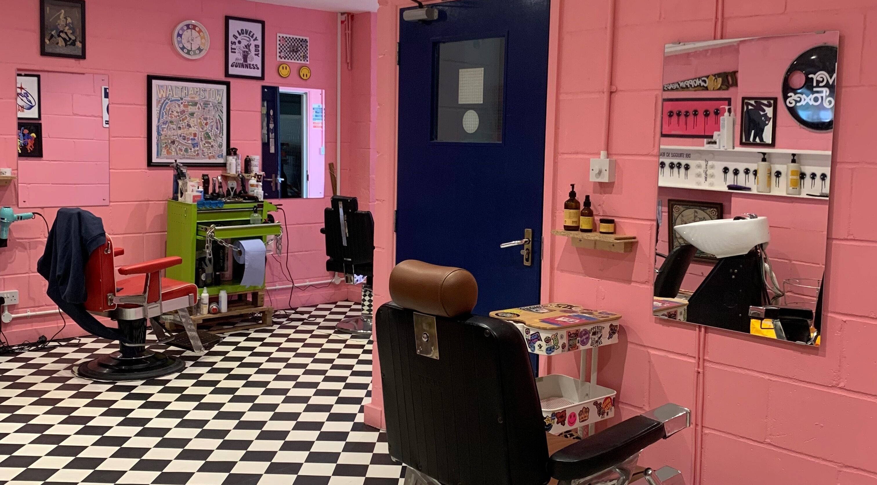 Colorful interior of Little Trimz salon in London, England, GB with retro chairs and stylish decor.