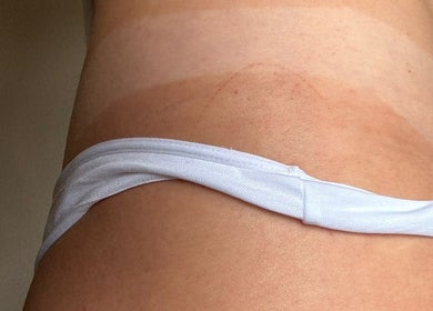 Glow Era's spray tan results at Rochester, England, GB, displaying even, seamless finish.