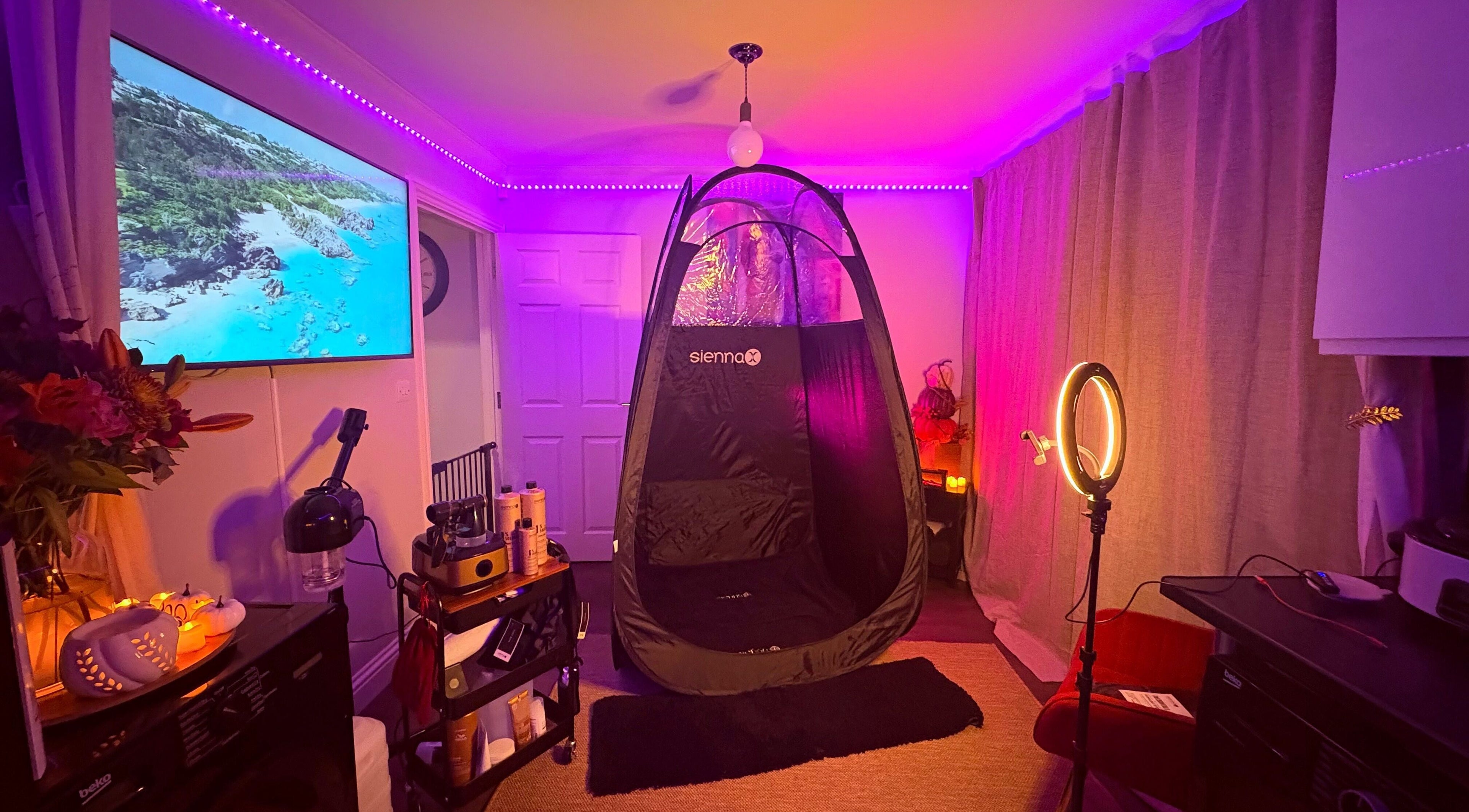 Cozy spa room at Glow Era, Rochester, England, GB with ambient lighting and relaxation decor.