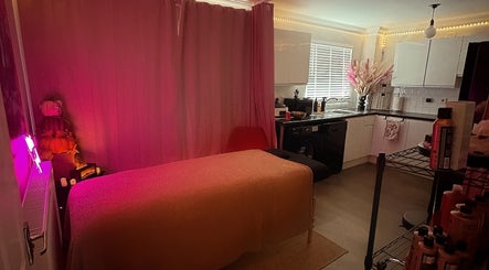 Cozy treatment room at Glow Era with ambient lighting in Rochester, England, GB.