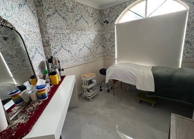 A tranquil treatment room at Derma Lift Studio, Winthrop, Western Australia, AU with elegant decor.