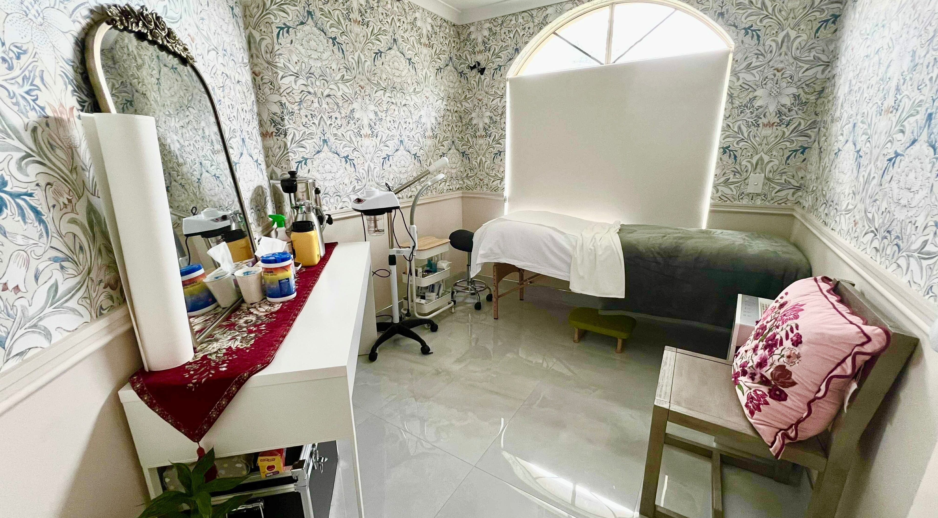 Serene treatment room at Derma Lift Studio, Winthrop, Western Australia, AU, featuring floral decor.