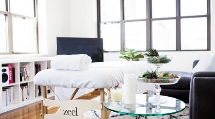 Massage table and plants at Aquila Health and Beauty | Home Services, Dubai, Dubai, AE.