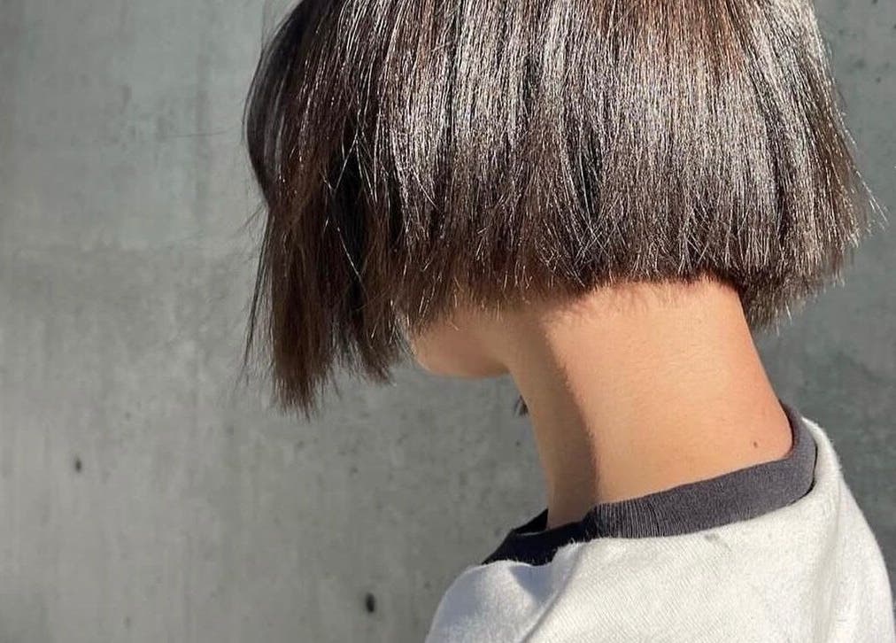 Stylish bob haircut at Ritzy’s Hair Studio in Windsor, England, GB, showcasing sleek, glossy hair.