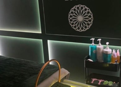 Modern treatment room at The Harmony Lounge in Radcliffe, England, GB, displaying a well-organized product cart.