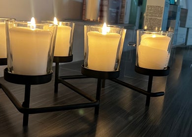 Elegant candles lit at Diora Med Spa, Milton, Ontario, CA creating a tranquil ambiance.