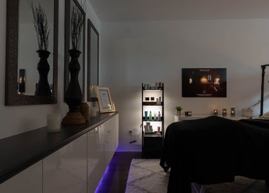 Tranquil spa room at Diora Med Spa, Milton, Ontario, CA with chic decor and skincare products.
