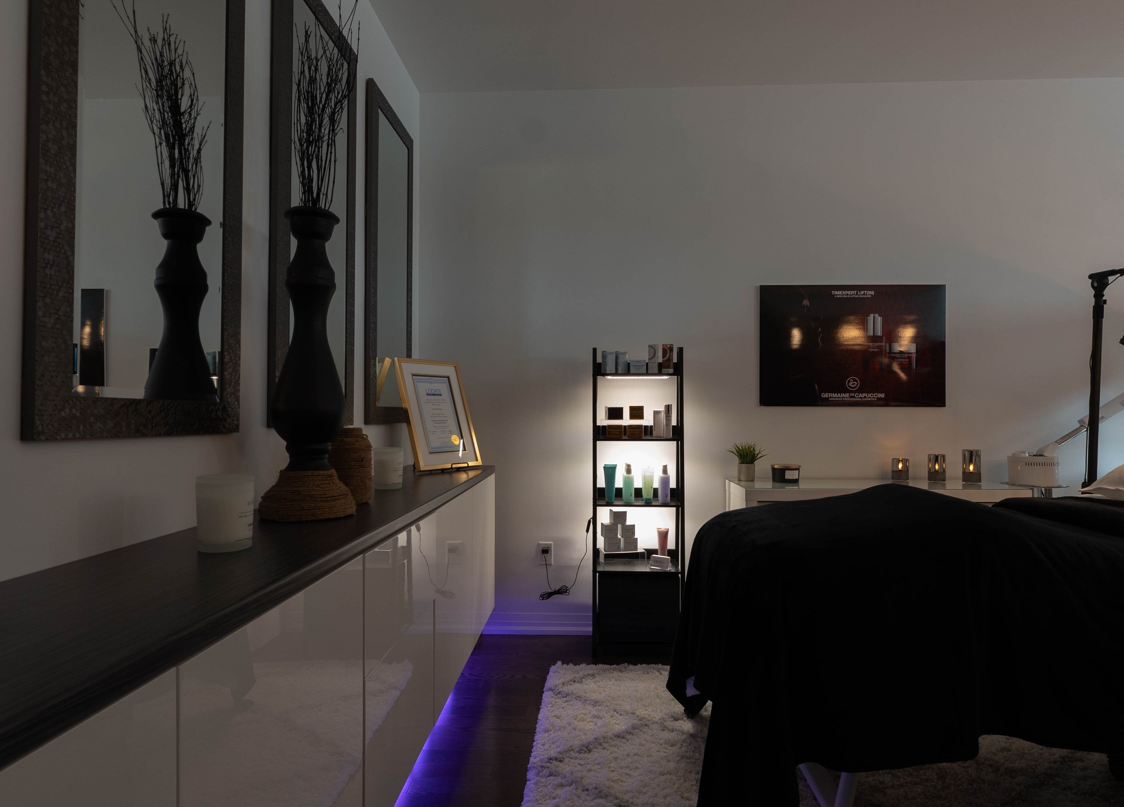 Relaxing interior of Diora Med Spa in Milton, Ontario, CA, featuring stylish décor and a treatment bed.