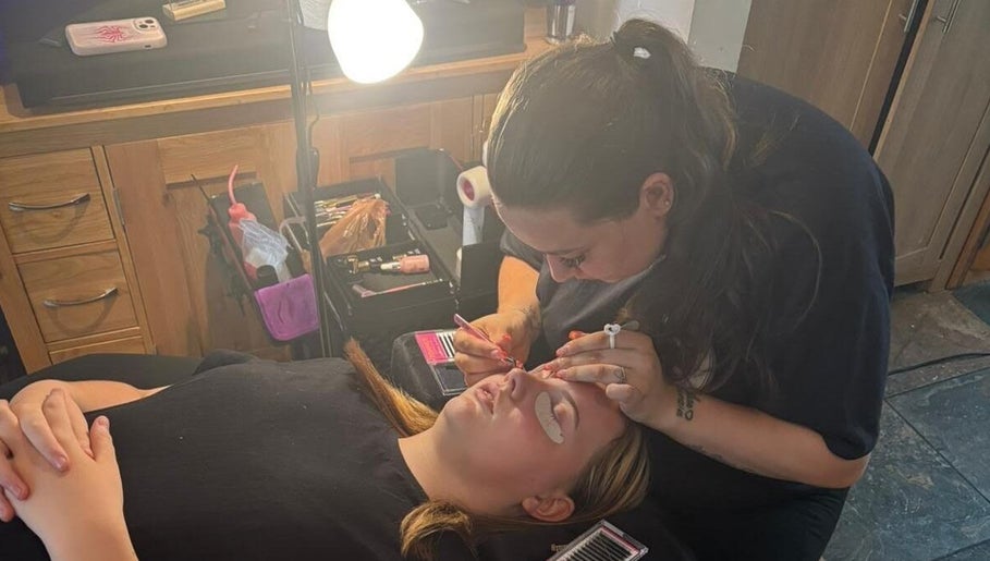 Eyelash extension service at Drive By Beauty in Dunstable, England, GB, showcasing precision and care.