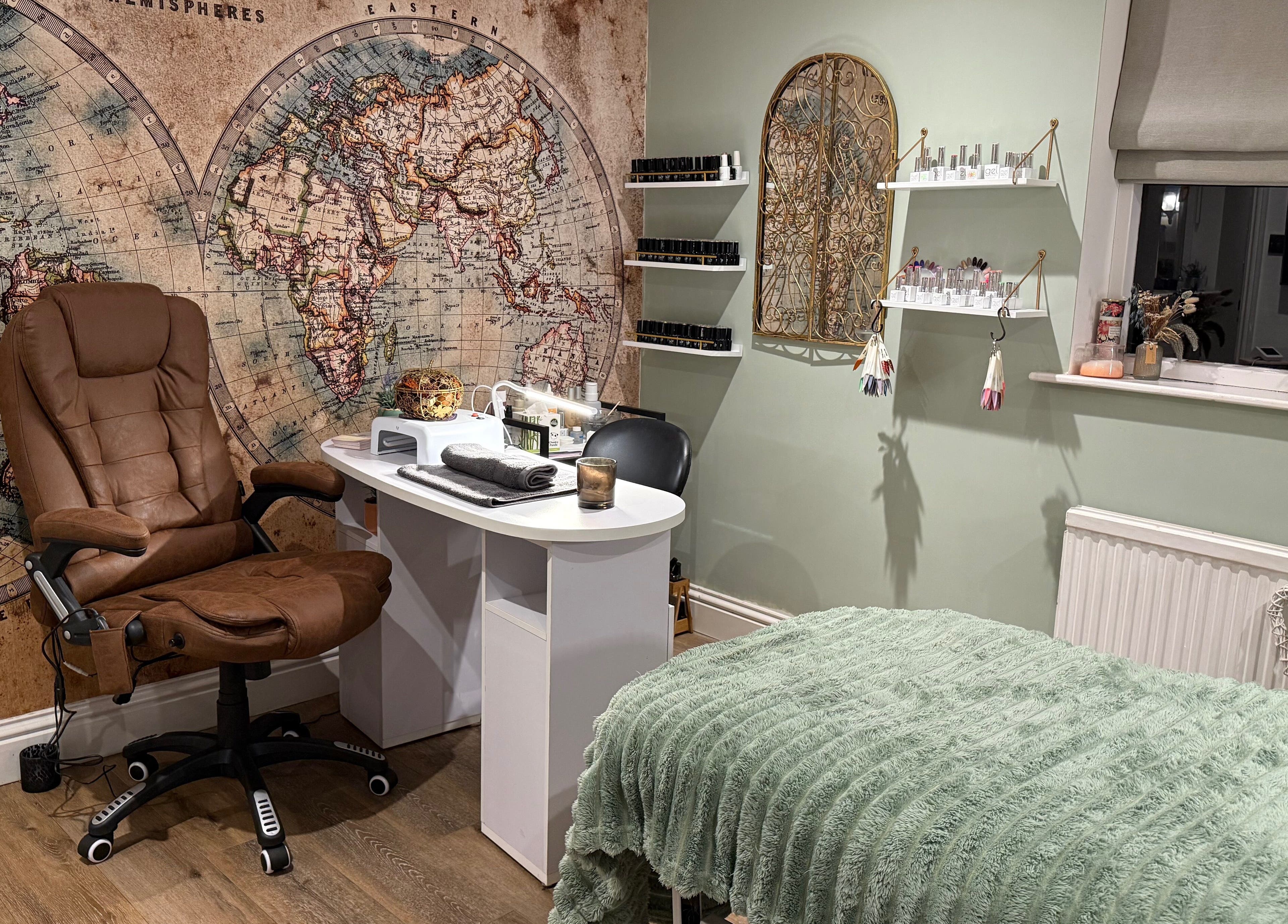 Inviting therapy room at Annabel's Beauty, Stowmarket, England featuring a cozy chair and global map decor.