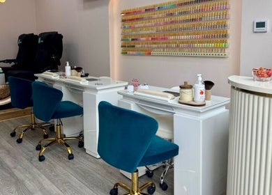 Relaxing nail salon interior at Saint Nails Caterham, Caterham, England, GB with stylish decor and manicure stations.