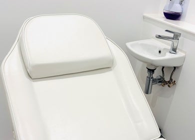 A pristine treatment chair in a tranquil room at Skin By Shannon, Tranent, Scotland, GB.