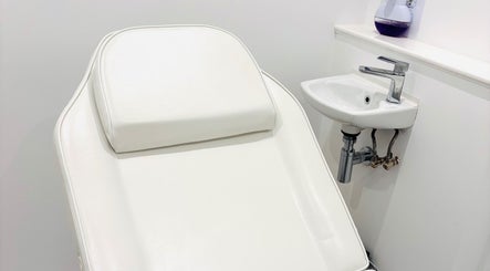 A pristine treatment chair in a tranquil room at Skin By Shannon, Tranent, Scotland, GB.