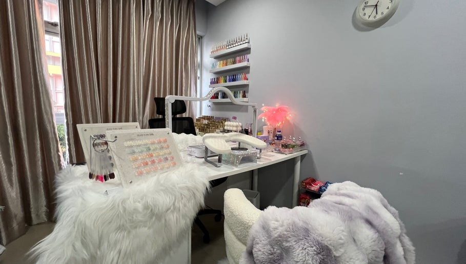 Killynails offers a polished manicure station with nail polish displays in Singapore, Singapore, SG.