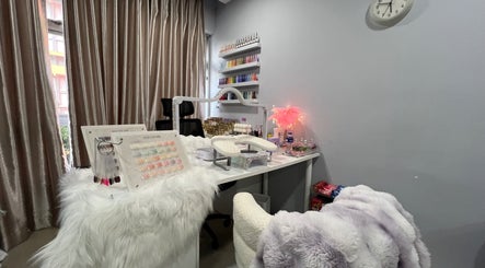 Killynails offers a polished manicure station with nail polish displays in Singapore, Singapore, SG.